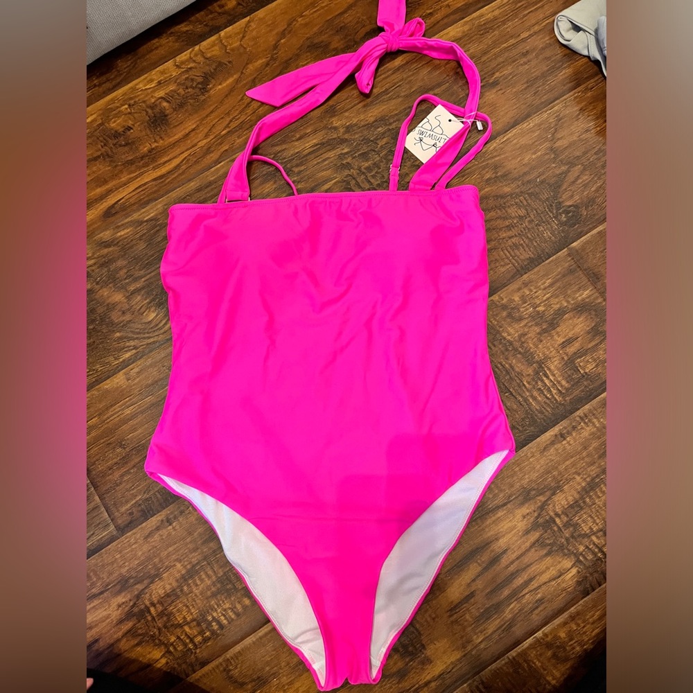 NWOT! Hot pink one piece bathing suit.